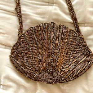 Shell shaped small beaded bag copper gold color